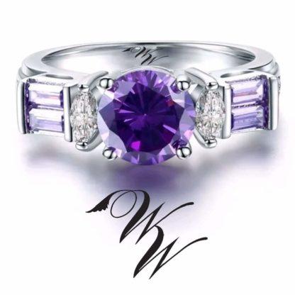 Round Amethyst Solitaire with 2 Marquise White Sapphire and 4 Amethyst Baguettes all set in Sterling Silver